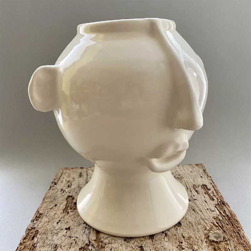 Lucio - Glossy cream enamel handmade ceramic head vase with reliefs